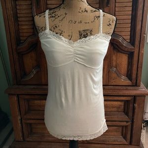 Woman’s cotton/polyester top, size @ a medium.